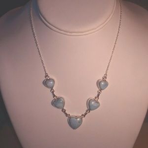 Brand new !32.32cts of natural blue Larimar hearts set in sterling silver .